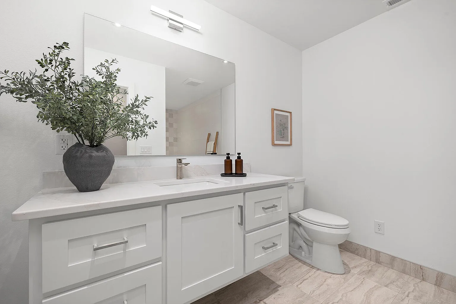 Guest bathroom vanity with greenery styling - 2807 S 14th Ave, Ozark, MO