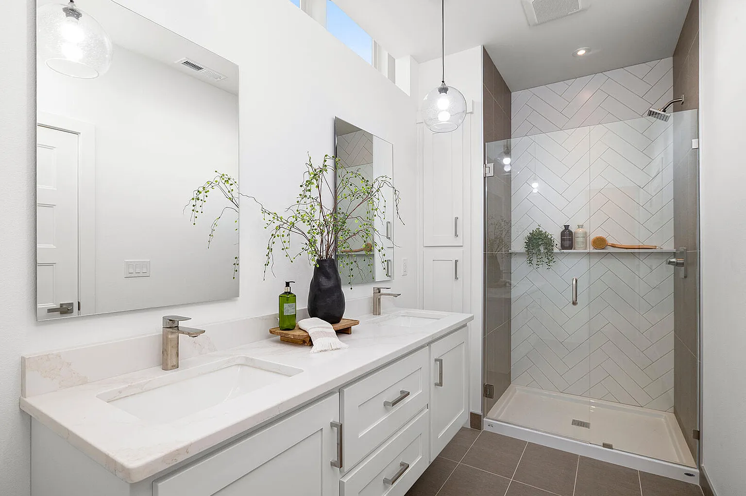Master bathroom double vanity with walk-in herringbone shower - 2807 S 14th Ave, Ozark, MO